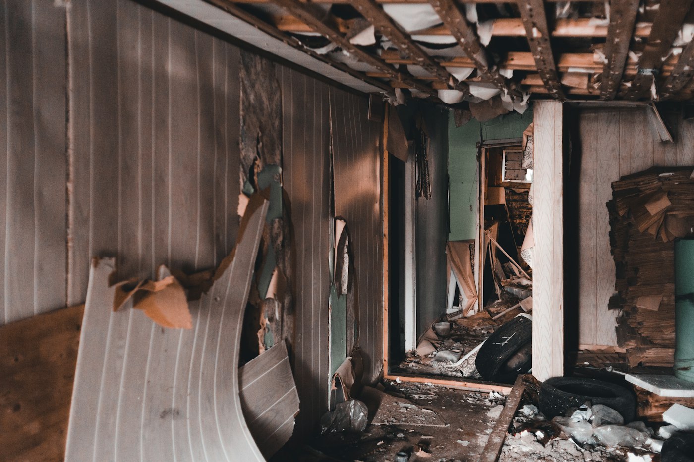 Exposed wood framing after moisture damage