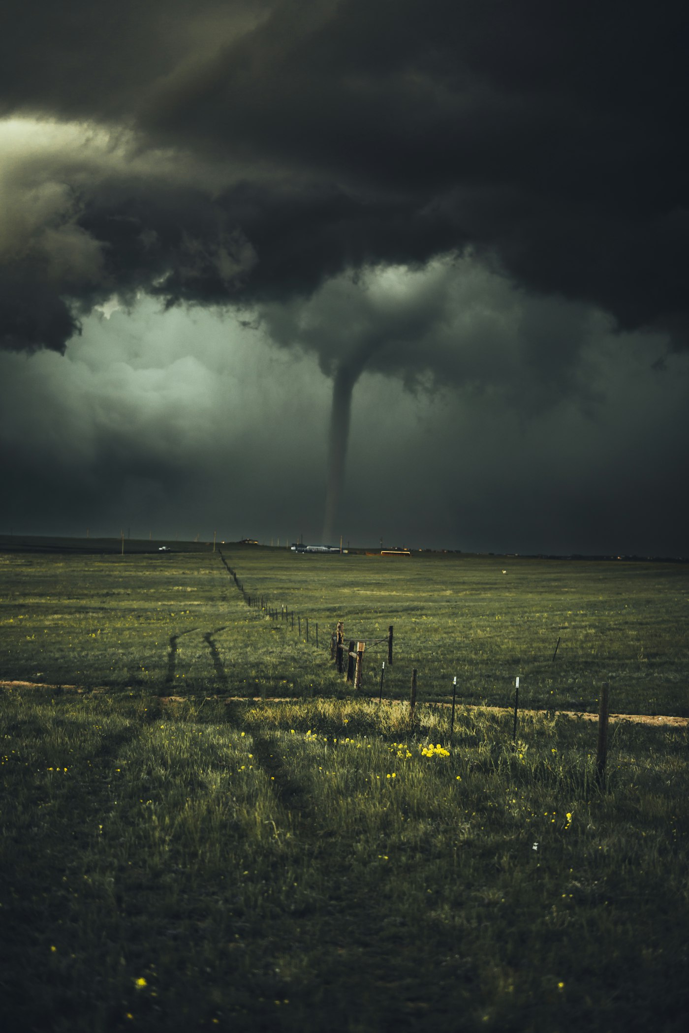Severe storm funnel cloud over open Texas-style prairie